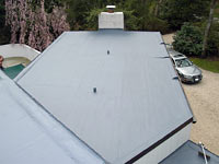 residential flat roof with acrylic membrane application photo